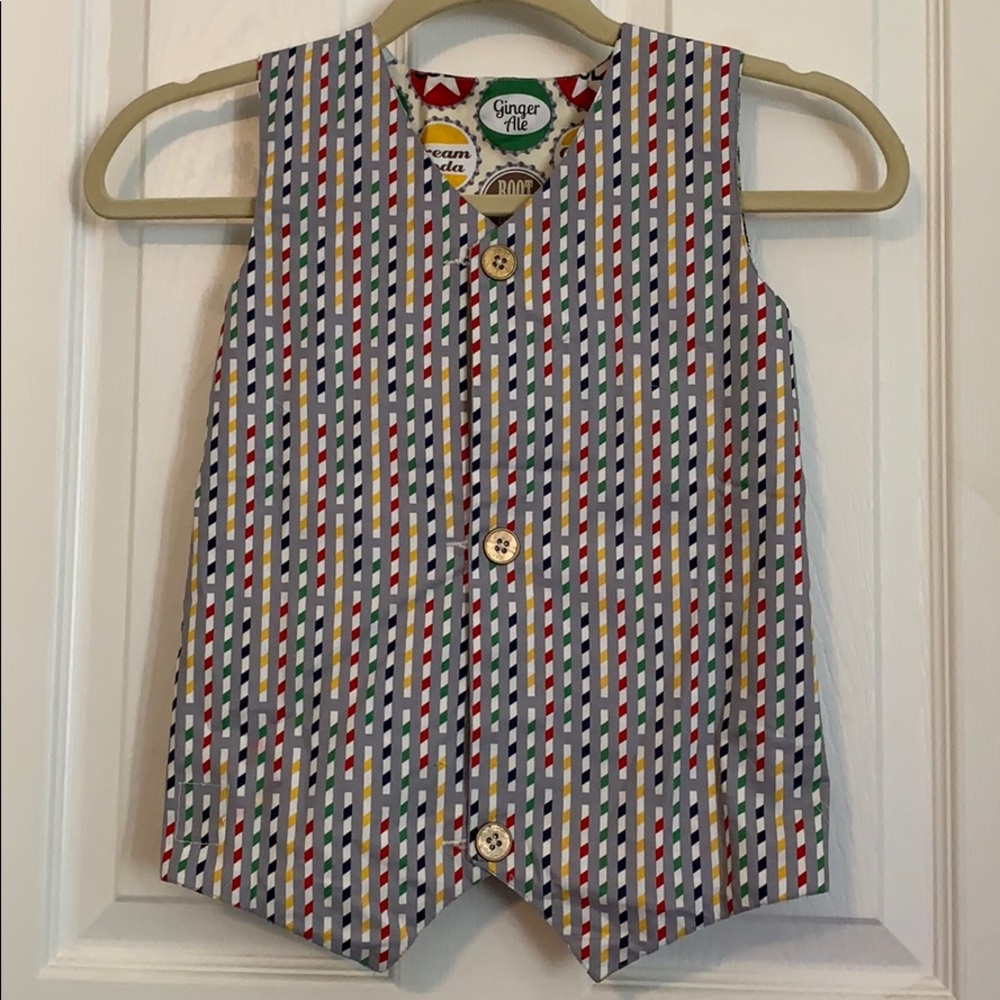 Children’s reversible vest. Soda pop/striped straw